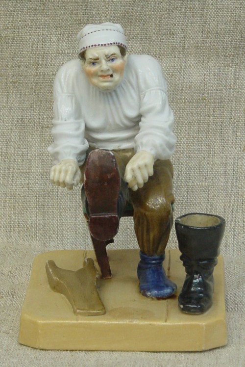 Скульптура «Мужик, натягивающий сапог». 1870-е